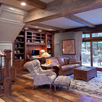 Weathered Antique Flooring and Box Beams in a Cozy Traditional Den