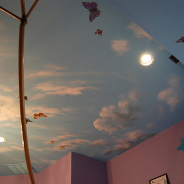 Sky Ceiling Mural with Butterflies, hand-painted in a bedroom by Mural Art LLC.