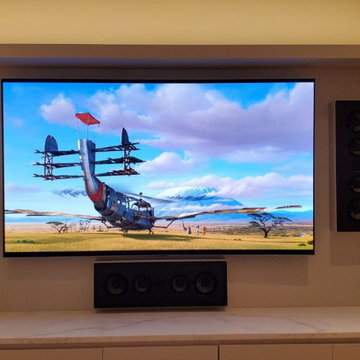 Media wall with in-wall speakers, centre channel and subwoofers - Calgary