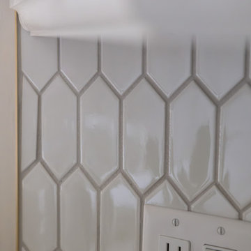 Contemporary White Kitchen Renovation with Custom Built-ins