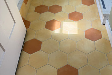 Mudroom - small eclectic ceramic tile and multicolored floor mudroom idea in Portland Maine
