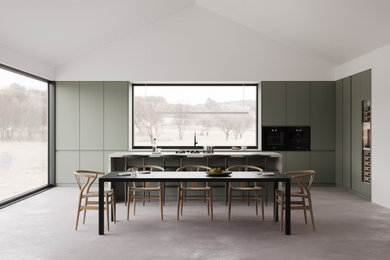 Example of a minimalist kitchen/dining room combo design in San Francisco