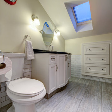 Trendy Attic Development in a 1926 Home