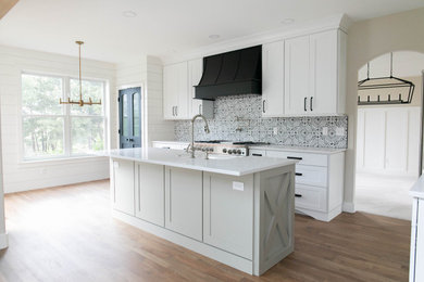 Example of a farmhouse kitchen design in Denver