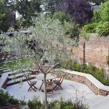 Walled town garden with views to a spectacular church