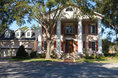 Red two-story exterior home photo in Charleston
