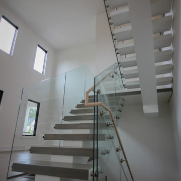 Project #80 | Mono-Beam Staircase with Glass Panels