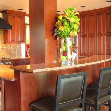 Raised bar seating on curved island