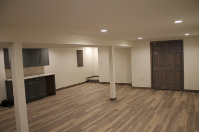 Example of a large trendy home design design in Other