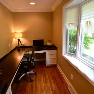 One useless space turns into two highly functional spaces; Mudroom & Office