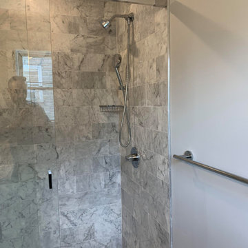 Carrara Marble Floor And Shower Design