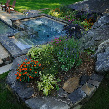 Raised Spa And Rectangular Pool With Auto Cover