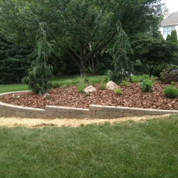 small retaining wall and landscaping