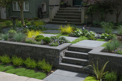 This is an example of a contemporary front yard landscaping in Vancouver.