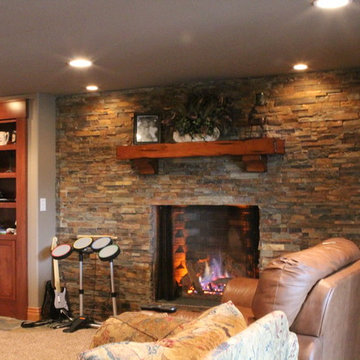 Eye-popping Denver Basement Remodel with hidden bookcase doors and tray ceilings