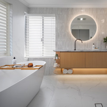 Modern Bright Bathroom with Bath