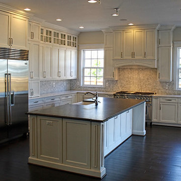 White L-Shape Kitchen Layout with Large Island