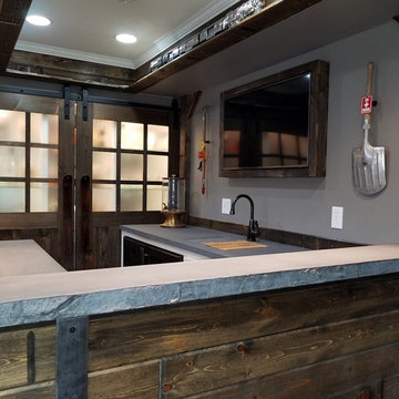 Home Bar and Entertainment Room with Concrete