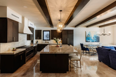 Inspiration for a mid-sized transitional l-shaped beige floor, exposed beam and travertine floor eat-in kitchen remodel with an undermount sink, shaker cabinets, dark wood cabinets, quartzite countertops, beige backsplash, stone slab backsplash, paneled appliances, an island and beige countertops