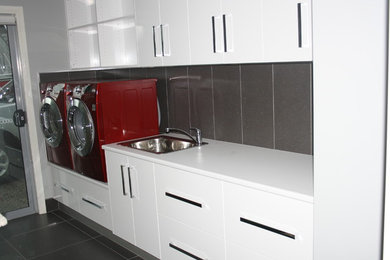 This is an example of a modern laundry room in Hobart.