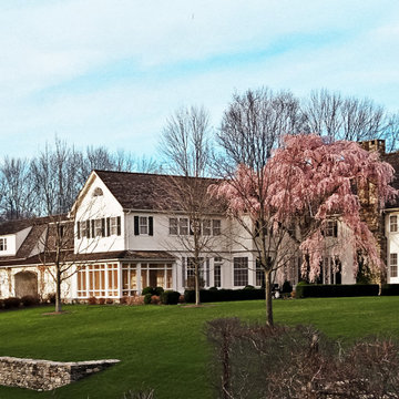 Waccabuc Main House w/ Field House beyond