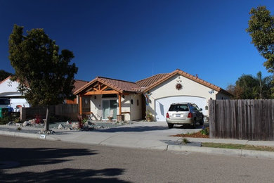 Example of a small tuscan white one-story stucco exterior home design in San Luis Obispo