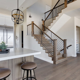 Inspiration for a mixed farmhouse wood u-shaped staircase in Salt Lake City with wood risers.