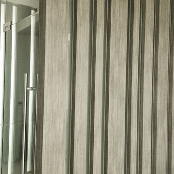 Brickell private condo - Custom columns wrapped with wood architectural film.