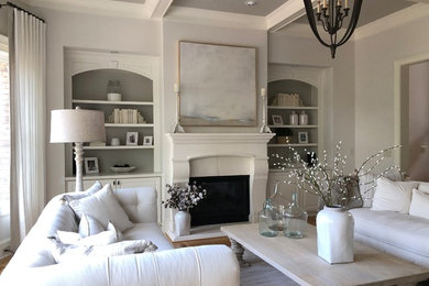 Large farmhouse formal and open concept medium tone wood floor and brown floor living room photo in Atlanta with gray walls, a wood stove, a concrete fireplace and no tv