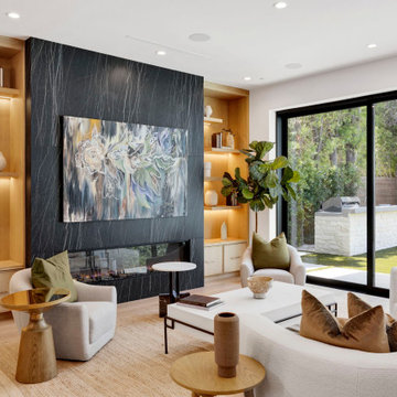 Living room opening to the pool and guest house