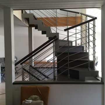 Escalier en bois balustrades en acier