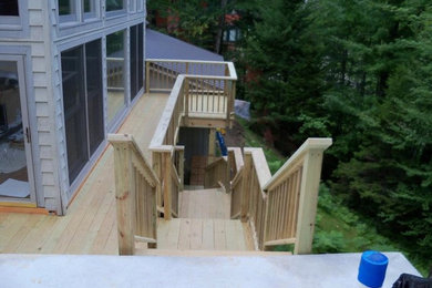 Patio - backyard patio idea in Boston with decking