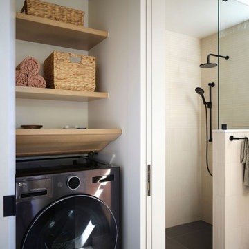 Hinged Wood Countertop Moves to Allow Access to Washer-Dryer Lint Trap