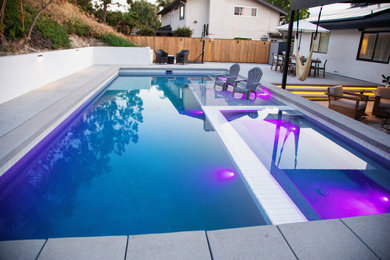 Example of a trendy home design design in San Diego