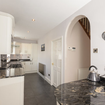 Give a traditional kitchen a modern twist with dramatic black accessories