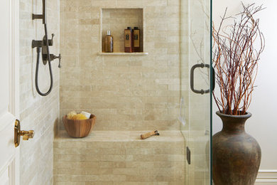 Inspiration for a transitional bathroom in Toronto with a corner shower, beige tile, a niche and a shower seat.