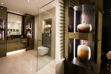 Photo of a modern wet room bathroom in London with glass-front cabinets, a wall mounted toilet, beige tiles, porcelain tiles, beige walls, ceramic flooring, a built-in sink, quartz worktops, beige floors, an open shower, brown worktops, a single sink and a built in vanity unit.