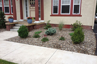 Photo of a front yard gravel formal garden in Other.