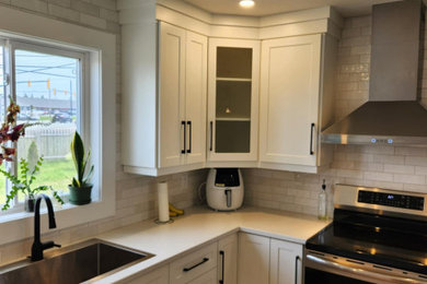 Mid-sized eclectic kitchen photo in Other with shaker cabinets, laminate countertops and ceramic backsplash