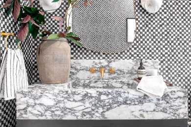 Example of a transitional bathroom design in Miami