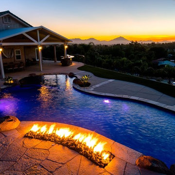 Pool with slide, water fall and fire feature!