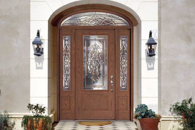 Inspiration for a large entryway remodel in Other with a dark wood front door