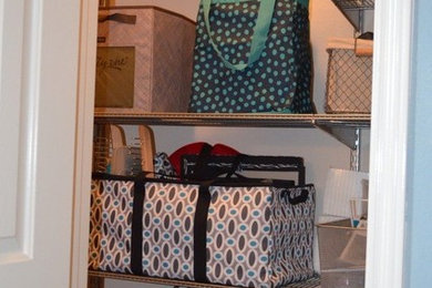 Small elegant closet photo in Austin with open cabinets