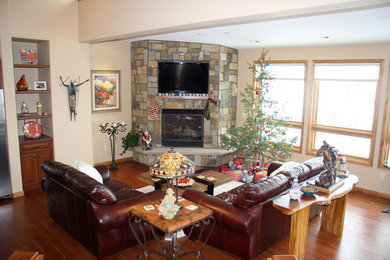 Living room - modern living room idea in Denver