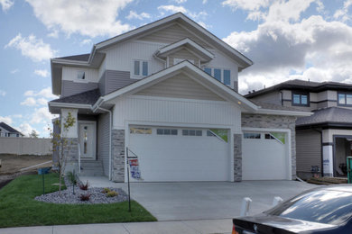 Example of an arts and crafts exterior home design in Edmonton