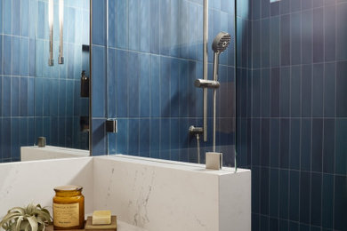 Bathroom - large blue tile and porcelain tile single-sink bathroom idea in Sacramento with an undermount sink, quartz countertops, white countertops and a built-in vanity