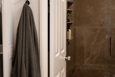 Bathroom - small industrial master brown tile and ceramic tile ceramic tile and beige floor bathroom idea in Orange County