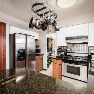 Striking Two-Tone Kitchen Remodel Done With Cabinet Refacing