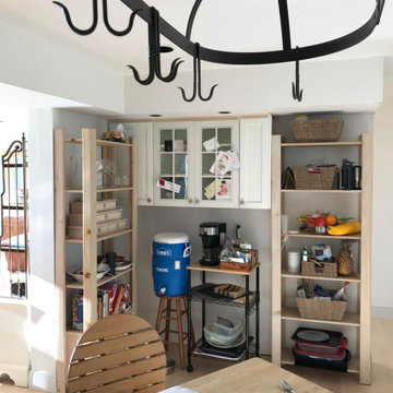Existing view of kitchen - pan view left.