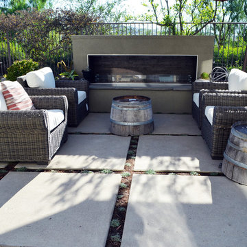 Linear fireplace, glass windscreen, conversation area